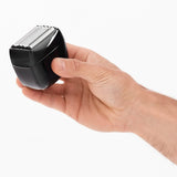 HERO Apex Shaver held in the palm of a hand